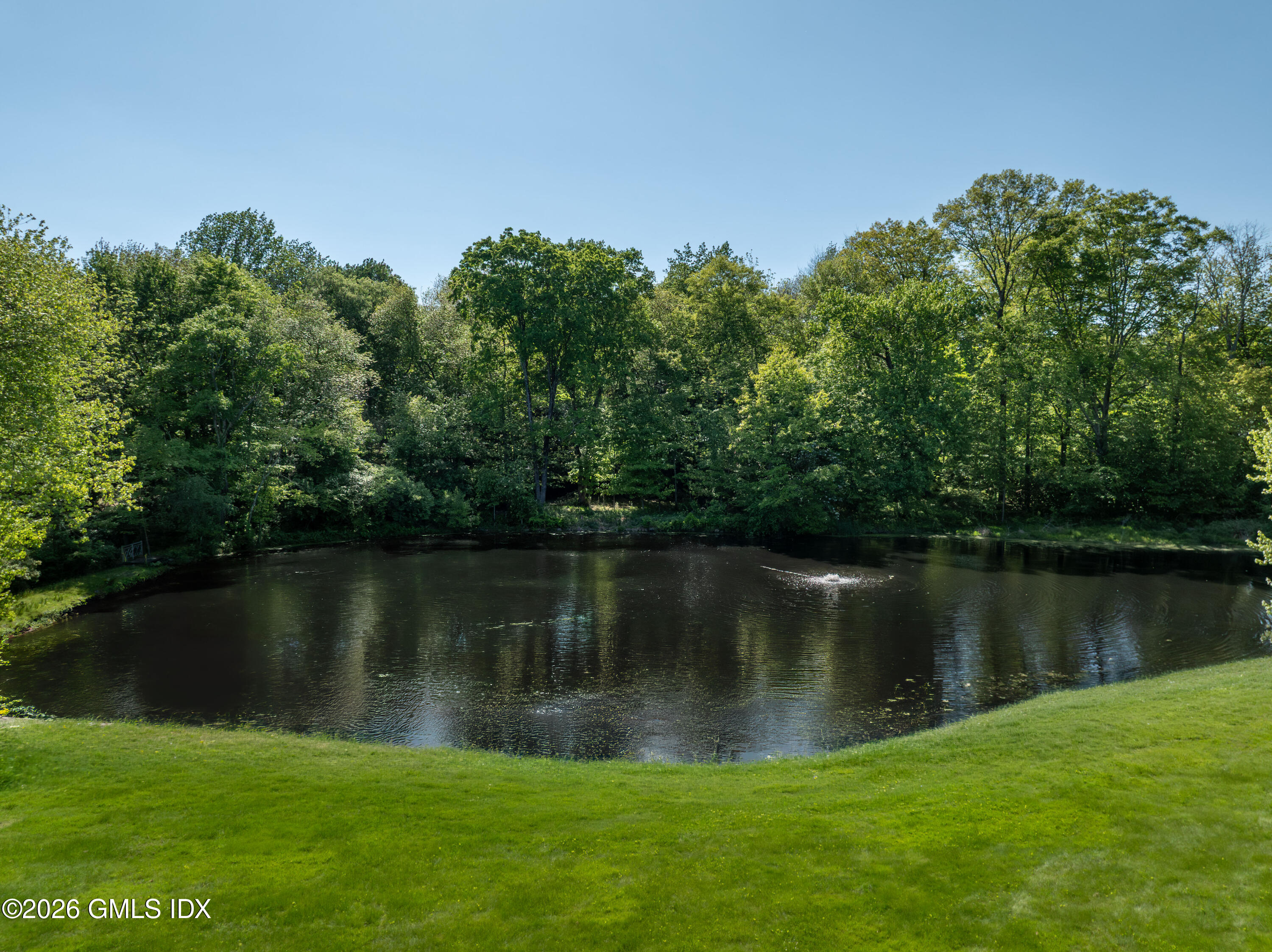 122 Round Hill Road Greenwich, CT 06831 - Photo 23 of 37 a view of a lake