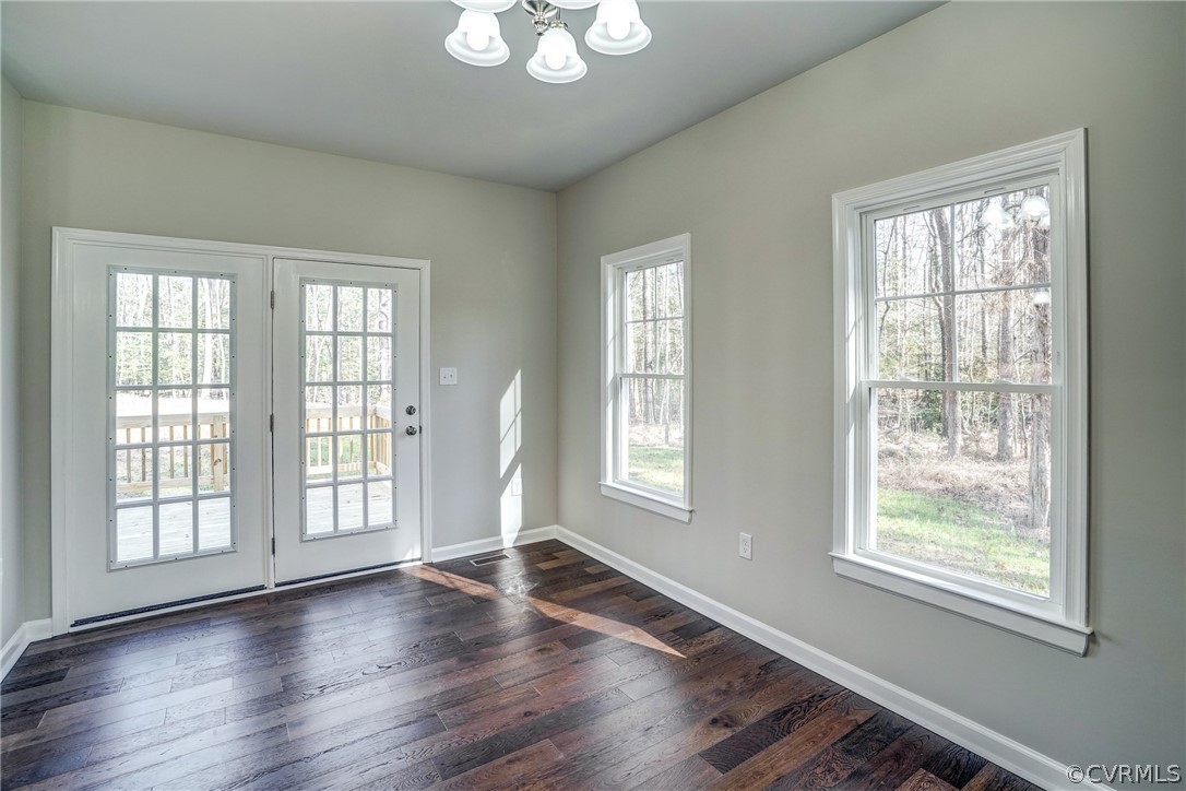 9421 Crumps Mill Road Quinton, VA 23141 - Photo 7 of 25 Dining Area with Access to the rear Exterior Deck