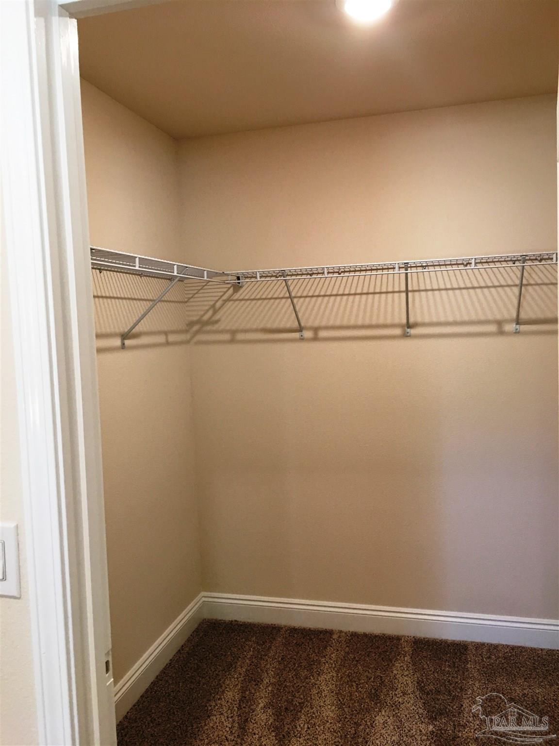 5430 South A Jones Road Milton, FL 32583 - Photo 14 of 27 Master bedroom has a large walk-in closet.