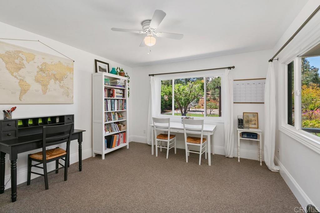 7880 Calle Dos Lagos Rancho Santa Fe, CA 92067 - Photo 14 of 44 a dining room with furniture and window