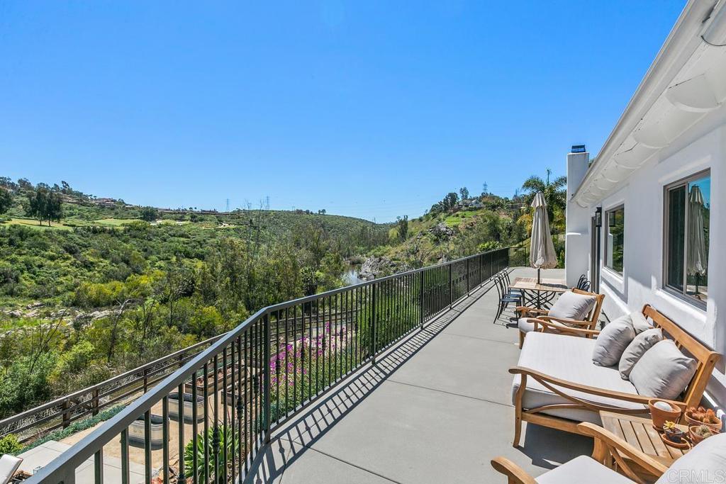7880 Calle Dos Lagos Rancho Santa Fe, CA 92067 - Photo 27 of 44 a view of a balcony with outdoor space