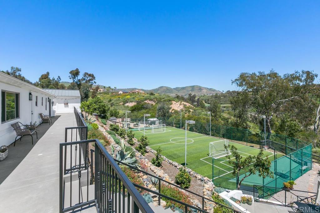 7880 Calle Dos Lagos Rancho Santa Fe, CA 92067 - Photo 28 of 44 a view of a city from a balcony