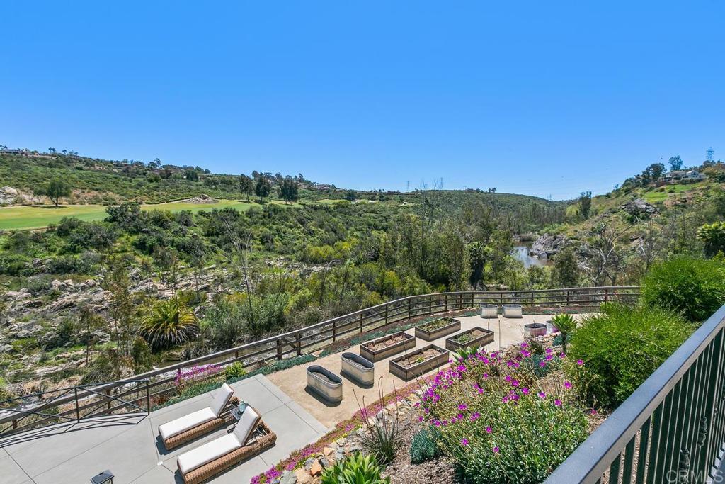 7880 Calle Dos Lagos Rancho Santa Fe, CA 92067 - Photo 30 of 44 a view of a city with lush green forest