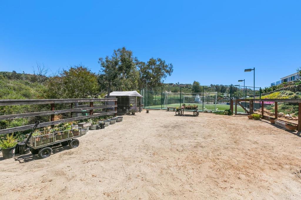 7880 Calle Dos Lagos Rancho Santa Fe, CA 92067 - Photo 37 of 44 a view of outdoor space with deck and lake view