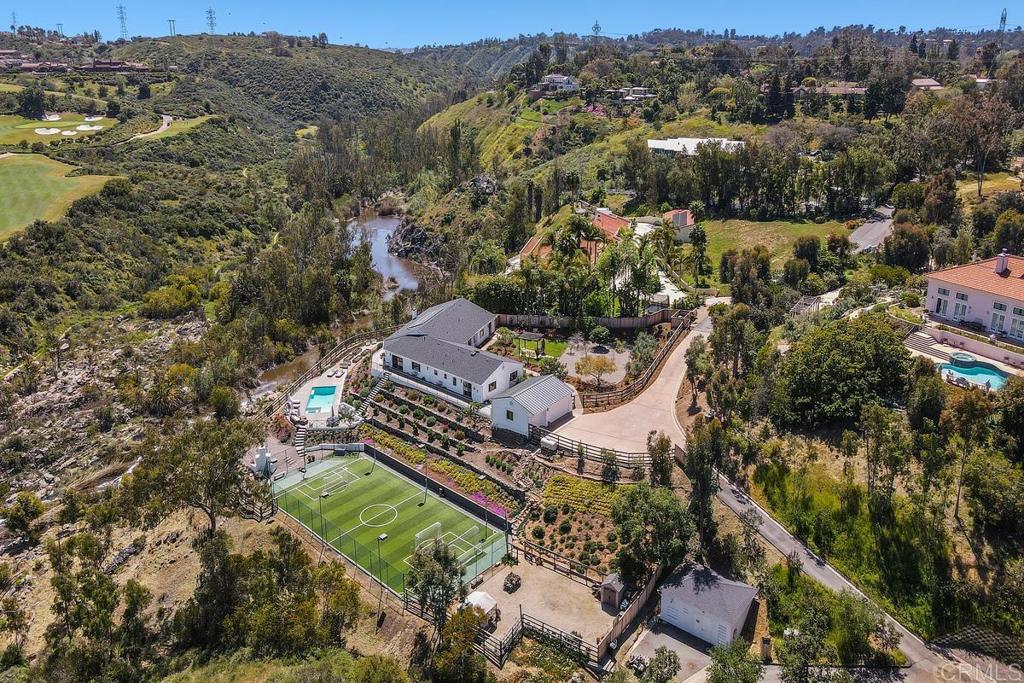 7880 Calle Dos Lagos Rancho Santa Fe, CA 92067 - Photo 40 of 44 an aerial view of a house with a yard