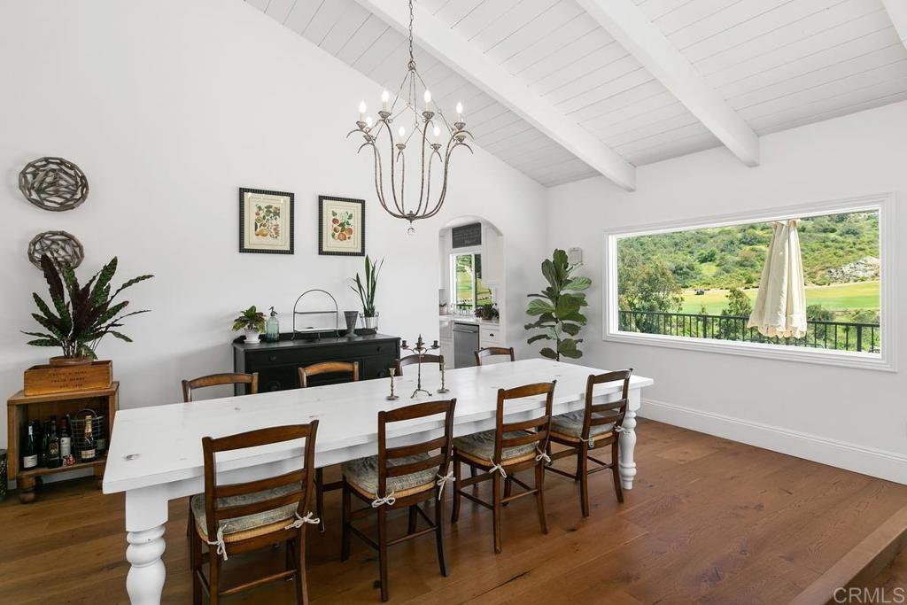 7880 Calle Dos Lagos Rancho Santa Fe, CA 92067 - Photo 5 of 44 a view of a dining room with furniture window and wooden floor