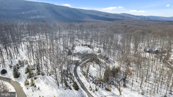 a view of mountain view with lots of trees