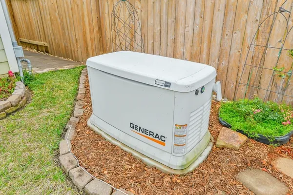 a view of washer and dryer with a wooden door