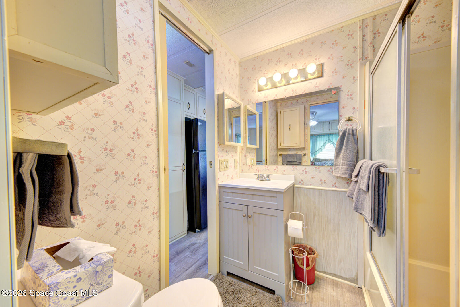 283 Buffalo Place Rockledge, FL 32955 - Photo 19 of 23 a bathroom with a sink a toilet and shower