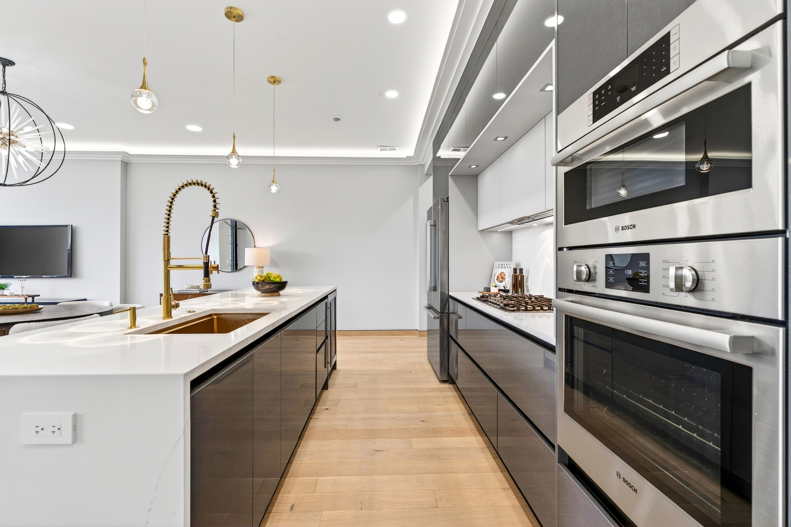 2024 West Irving Park Road, Unit 302 Chicago, IL 60618 - Photo 10 of 32 a kitchen with stainless steel appliances granite countertop a stove and a sink