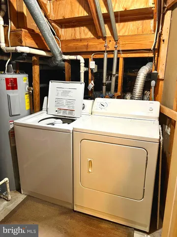 a view of a house with a yard and plants