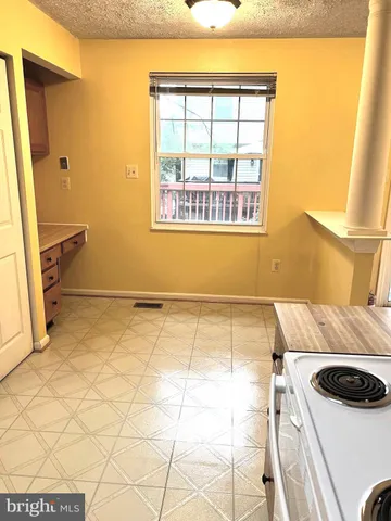 a bathroom with a sink and a window
