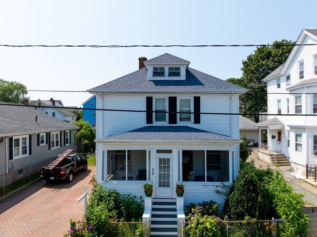 161 Foster Street Fall River, MA 02721 - Photo 1 of 20 a front view of a house with a porch