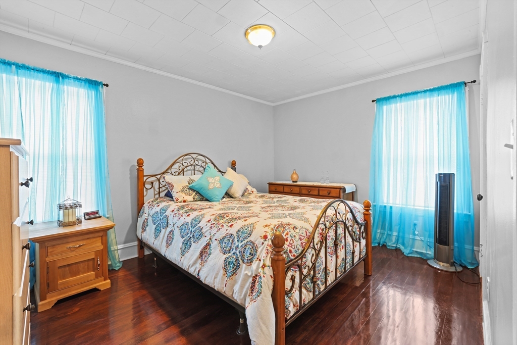 161 Foster Street Fall River, MA 02721 - Photo 14 of 20 a bedroom with a bed and window