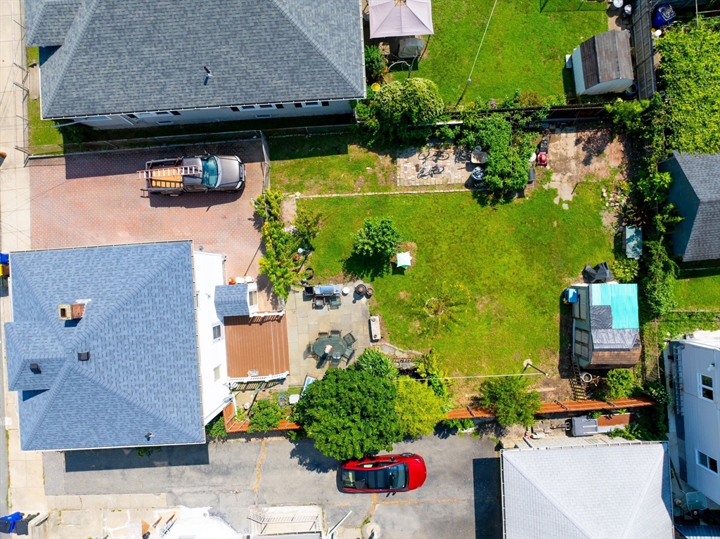 161 Foster Street Fall River, MA 02721 - Photo 3 of 20 an aerial view of a house with a yard