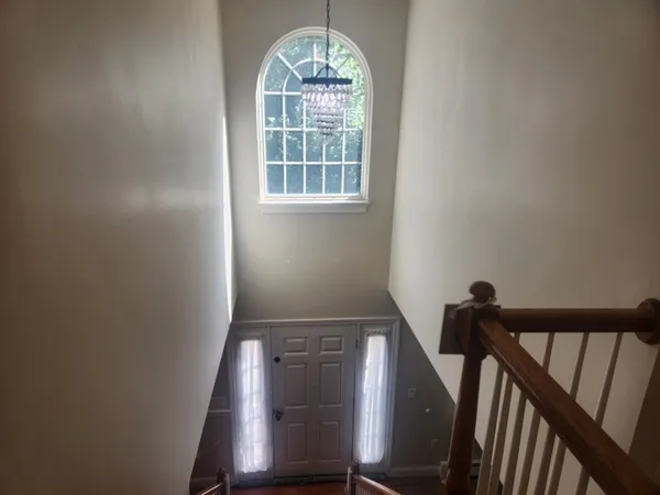 a view of entryway with wooden floor