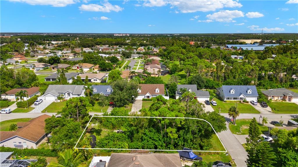 9167 Morris Road Fort Myers, FL 33967 - Photo 17 of 21 an aerial view of residential houses with outdoor space and ocean view