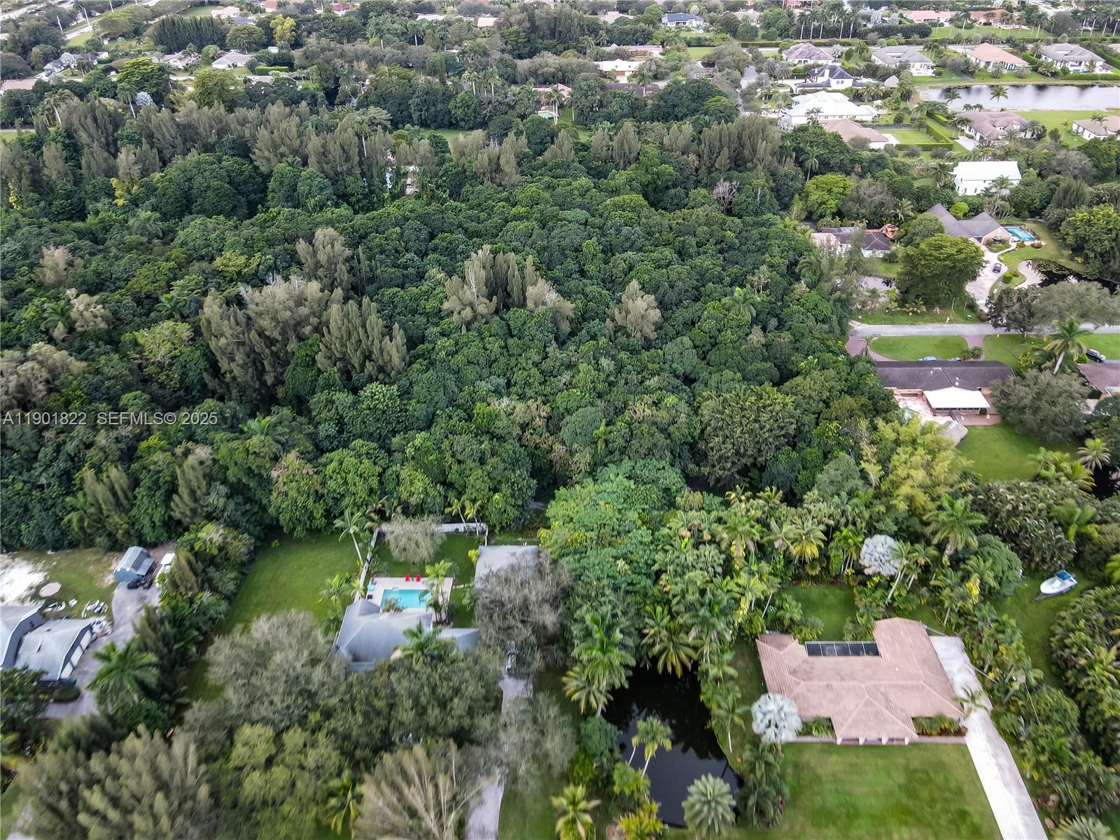 0 Southwest 103rd Avenue Davie, FL 33328 - Photo 8 of 13 an aerial view of a house with yard swimming pool and outdoor seating