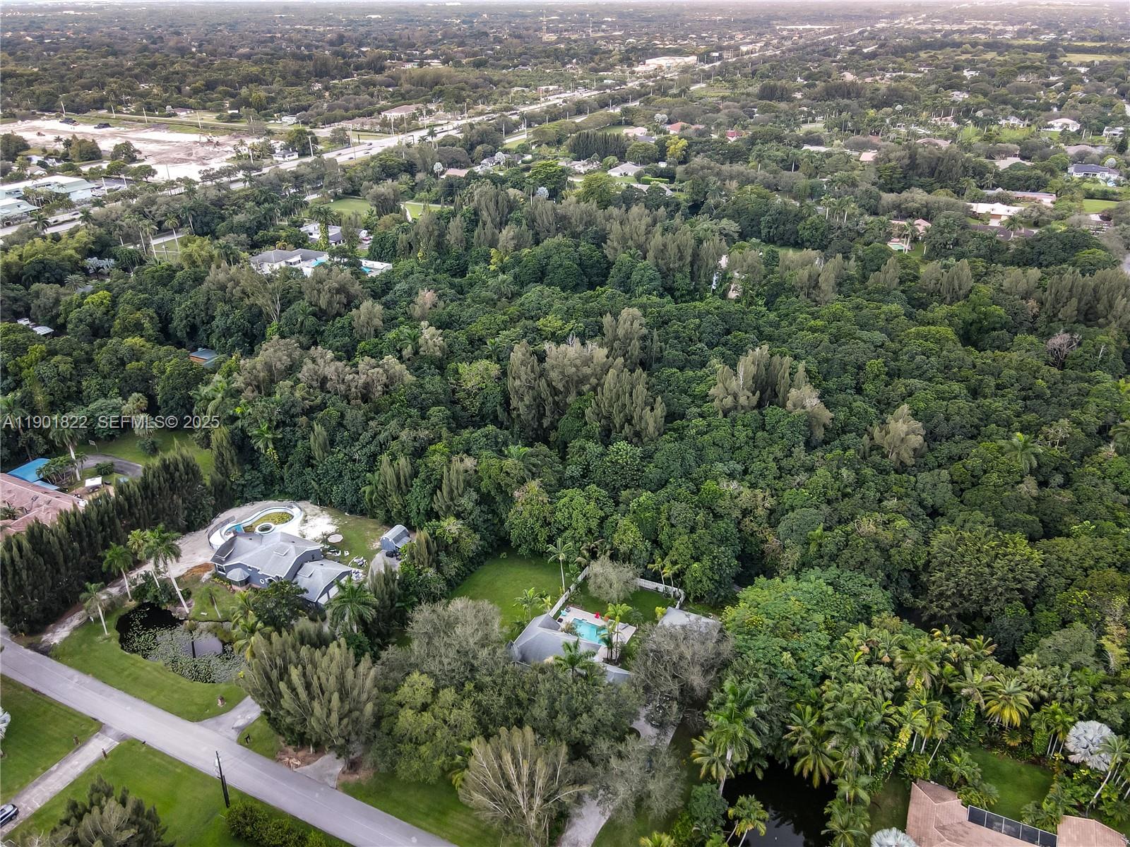 0 Southwest 103rd Avenue Davie, FL 33328 - Photo 9 of 13 an aerial view of a city with lots of residential buildings