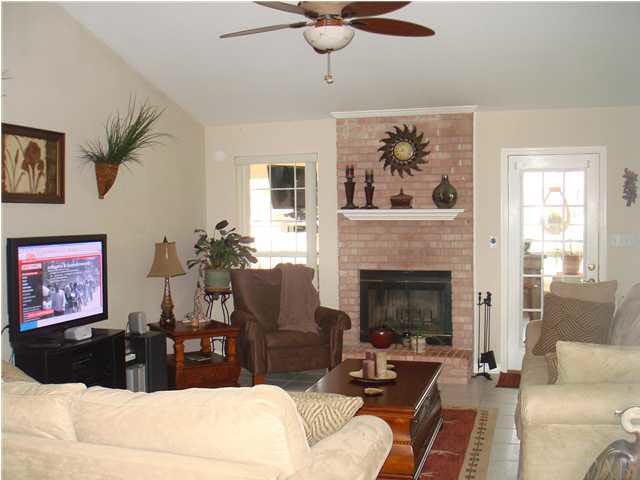 600 Copper Ridge Drive Cantonment, FL 32533 - Photo 5 of 22 Wood burning fireplace in Great room, new ceiling fan.