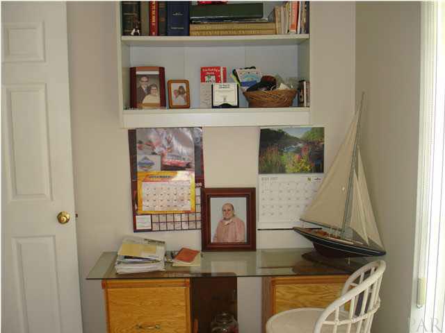 600 Copper Ridge Drive Cantonment, FL 32533 - Photo 9 of 22 Husbands walkin closet soo big he made office space on one end.