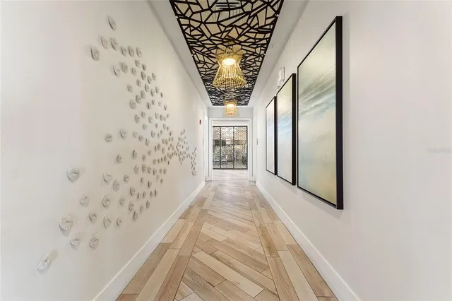 an aerial view of a house with garden space and lake view