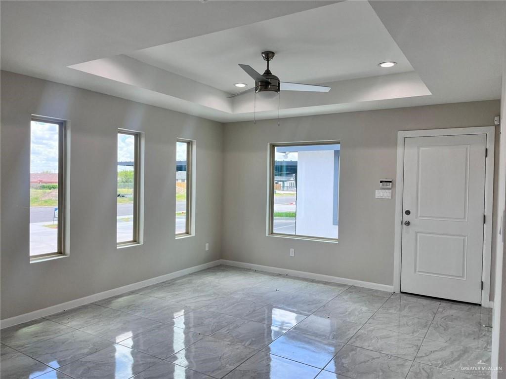 702 Palmer Road, Unit 1 Mission, TX 78573 - Photo 11 of 13 a view of an empty room with a window