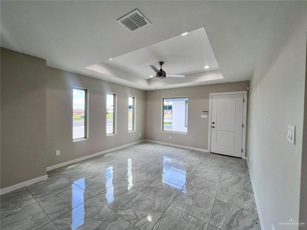 702 Palmer Road, Unit 1 Mission, TX 78573 - Photo 12 of 13 a view of an empty room with a window