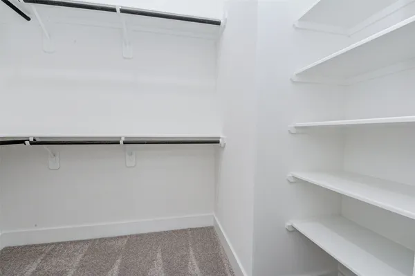a view of small space with racks on the wall