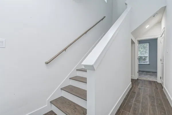 a view of entryway with wooden floor