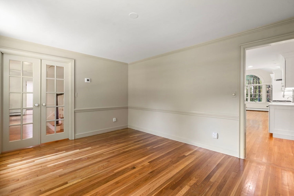 13 Wood Road Sherborn, MA 01770 - Photo 11 of 38 wooden floor in an empty room with a window