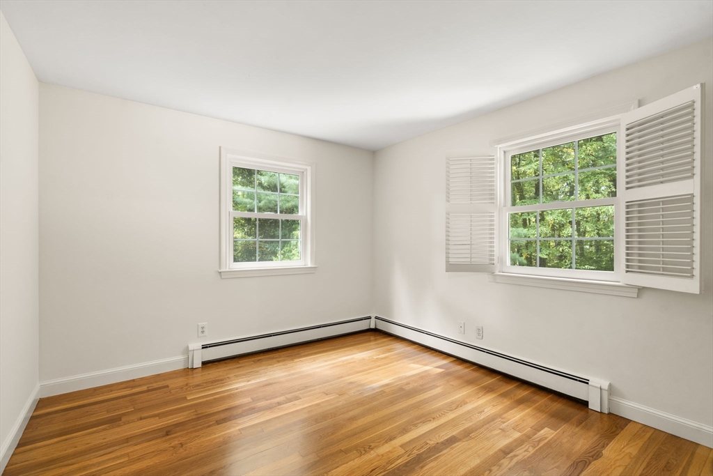 13 Wood Road Sherborn, MA 01770 - Photo 32 of 38 an empty room with a window