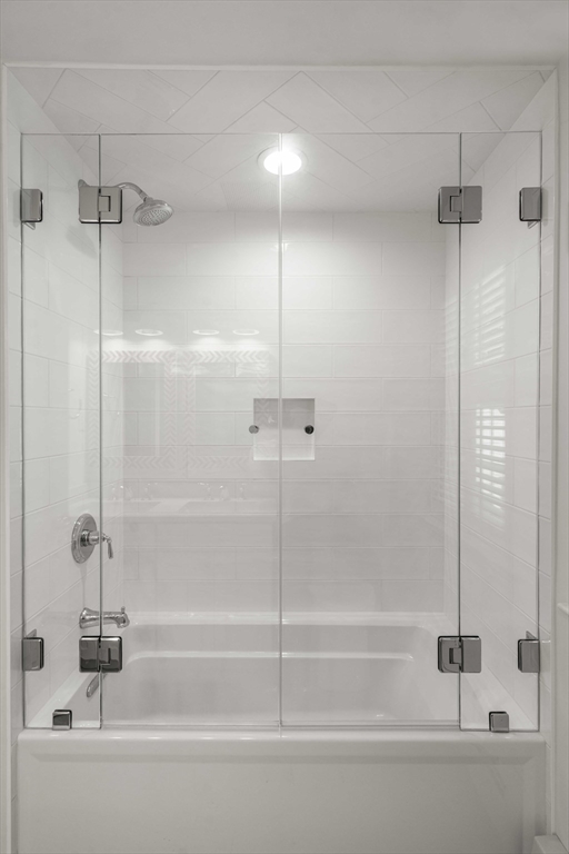 13 Wood Road Sherborn, MA 01770 - Photo 34 of 38 a bathroom with a bathtub and a shower