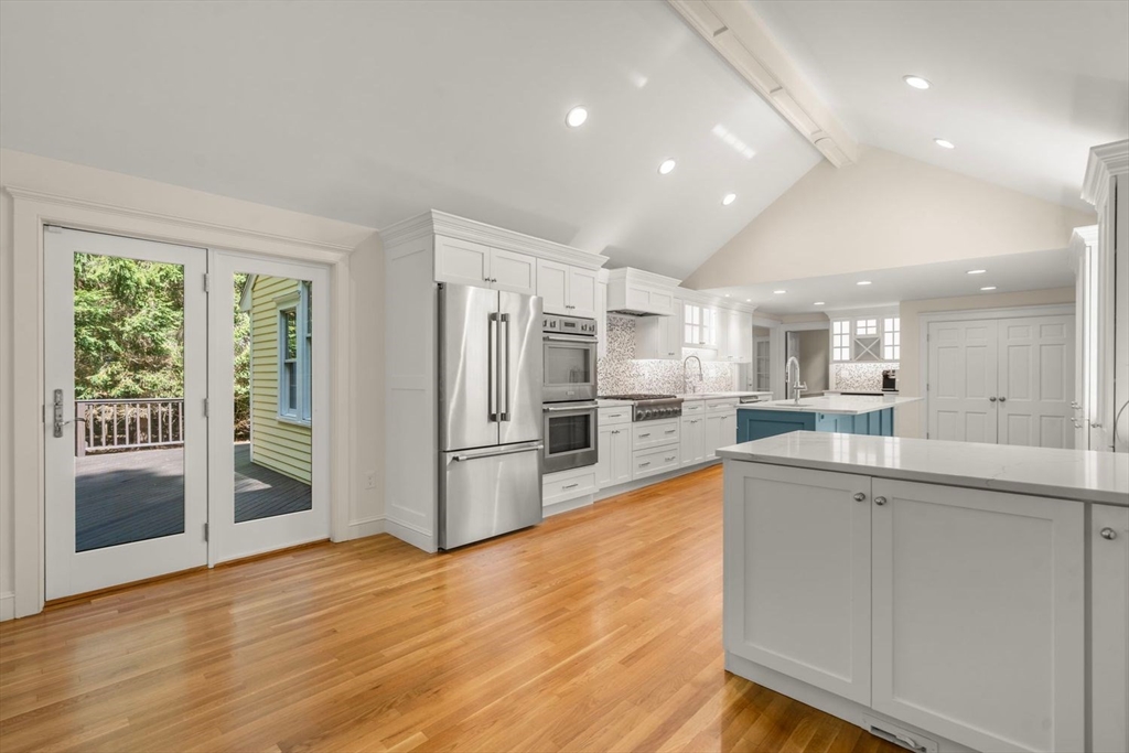 13 Wood Road Sherborn, MA 01770 - Photo 7 of 38 a kitchen with stainless steel appliances granite countertop a refrigerator and a sink