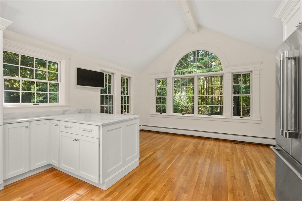 13 Wood Road Sherborn, MA 01770 - Photo 8 of 38 a kitchen with a sink and wooden floor