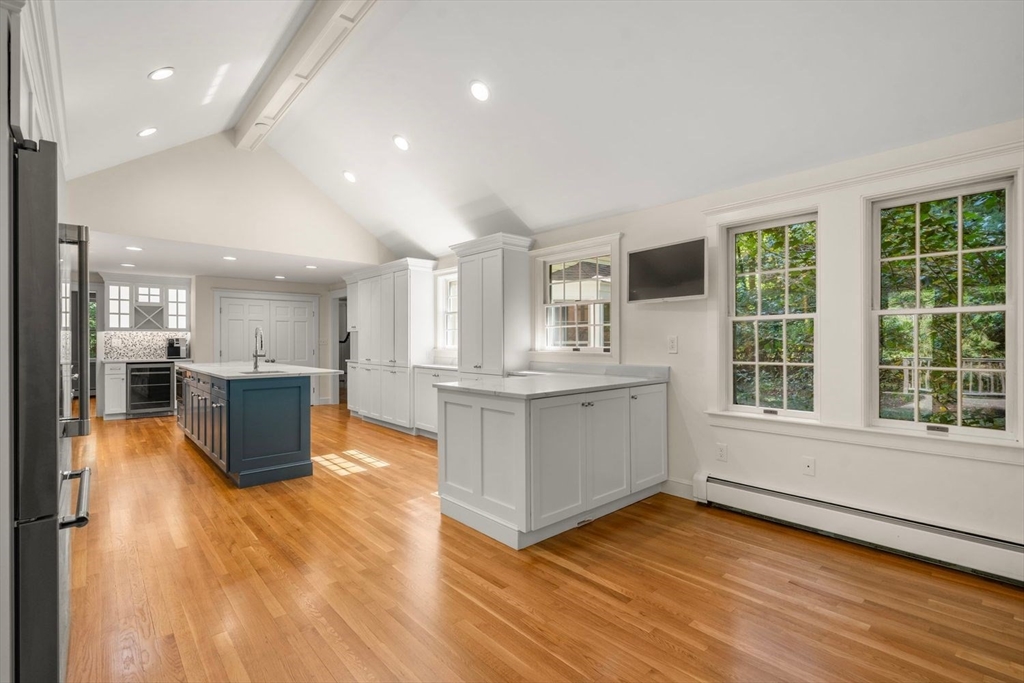 13 Wood Road Sherborn, MA 01770 - Photo 10 of 38 a view of kitchen with cabinets and wooden floor
