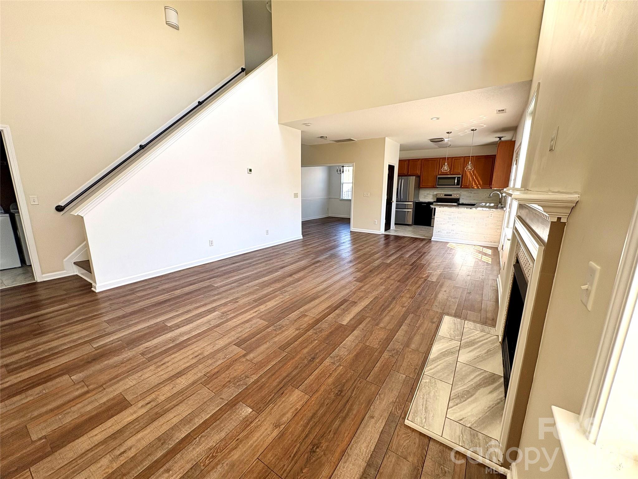 89 Woodfern Road Fletcher, NC 28732 - Photo 5 of 19 a view of empty room with wooden floor