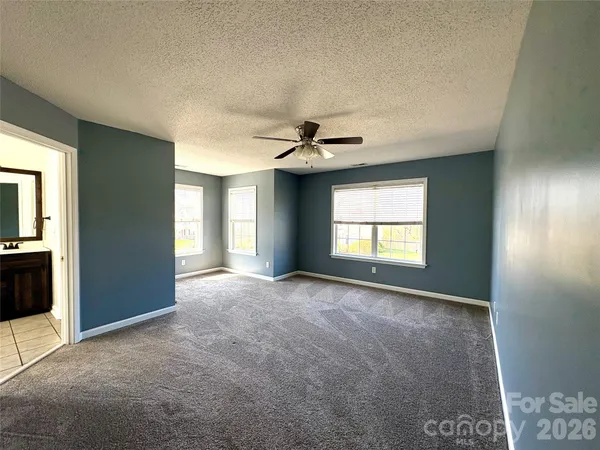 a view of a room and window