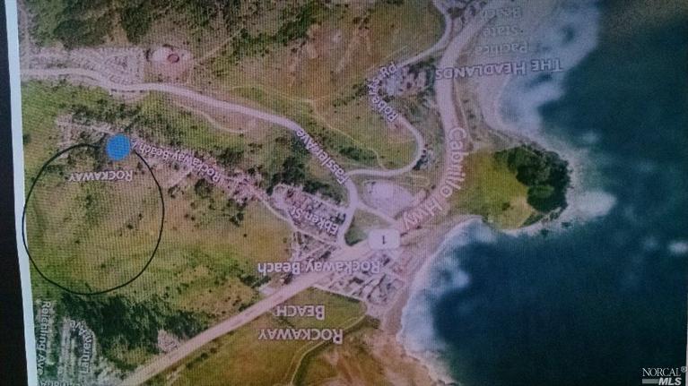 22 Rockaway Beach Avenue Pacifica, CA 94044 - Photo 1 of 1 a view of painting on the wall and shower