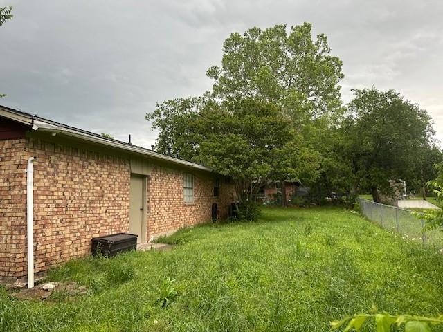209 School Street Blue Ridge, TX 75424 - Photo 9 of 9 a backyard of a house with lots of green space