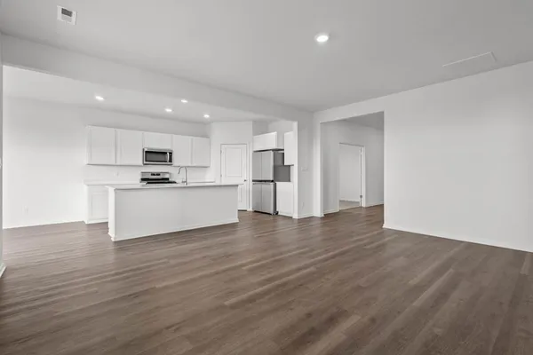 an empty room with windows