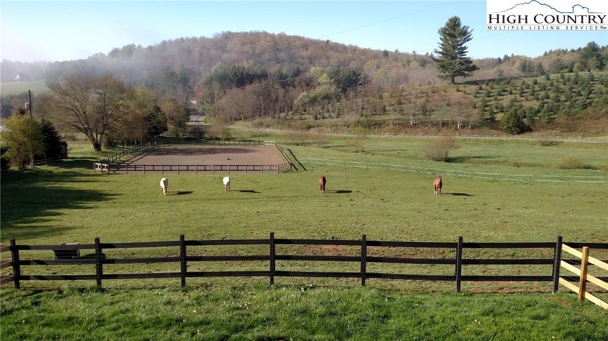 1453 Big Flatts Church Road Fleetwood, NC 28626 - Photo 16 of 50 a view of a lake with houses