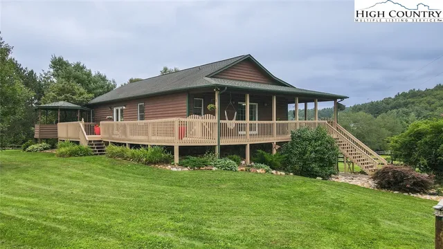 an aerial view of residential house with outdoor space