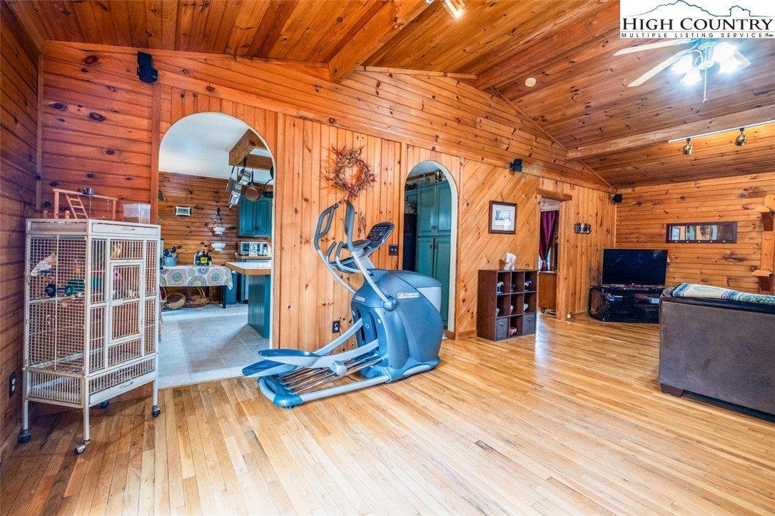 1453 Big Flatts Church Road Fleetwood, NC 28626 - Photo 21 of 50 a view of a room with wooden floor and furniture