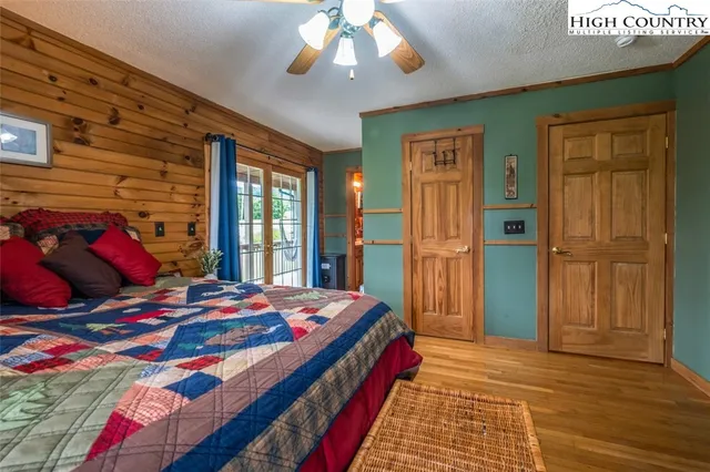 a bathroom with a sink a toilet and shower curtain