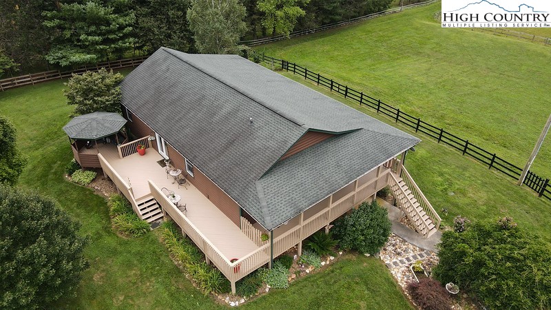 1453 Big Flatts Church Road Fleetwood, NC 28626 - Photo 3 of 50 an aerial view of residential house with outdoor space