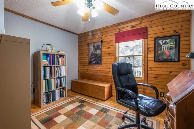 a bathroom with a sink a toilet and shower curtain