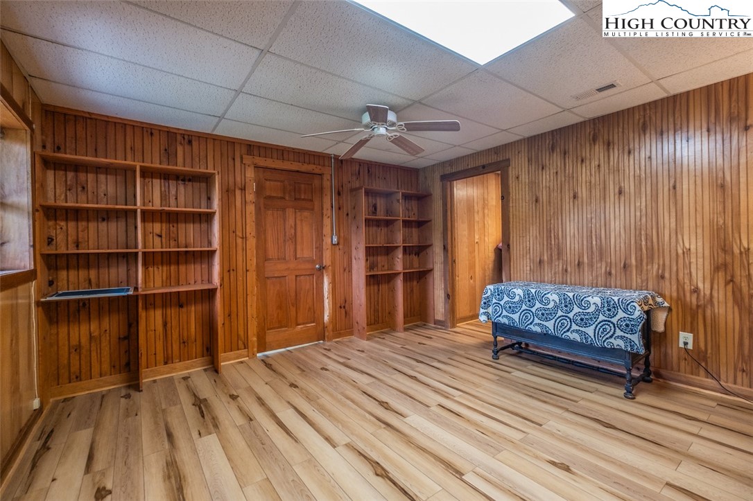 1453 Big Flatts Church Road Fleetwood, NC 28626 - Photo 38 of 50 a living room with a furniture and a rug