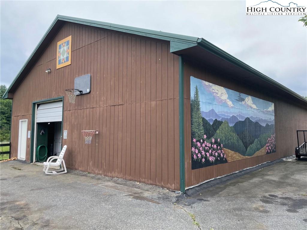 1453 Big Flatts Church Road Fleetwood, NC 28626 - Photo 42 of 50 a view of a door and chair