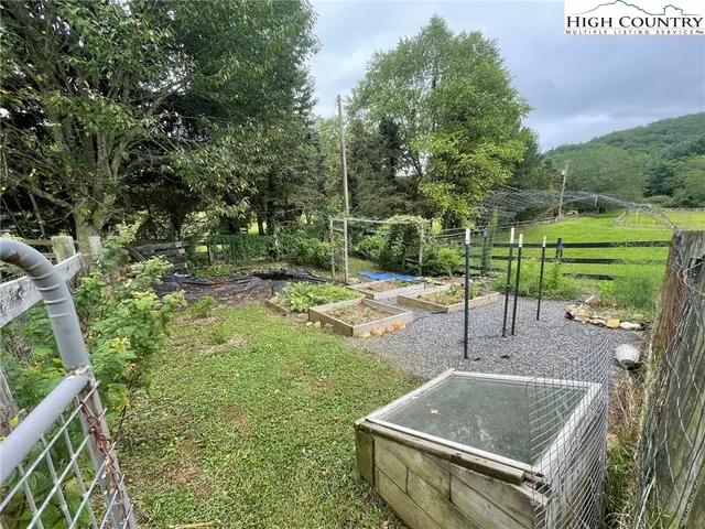 a view of a house with a garden